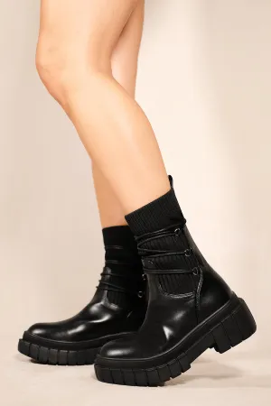 LANDRY CHUNKY SOLE ANKLE BOOTS WITH KNITTED SOCK IN BLACK FAUX LEATHER